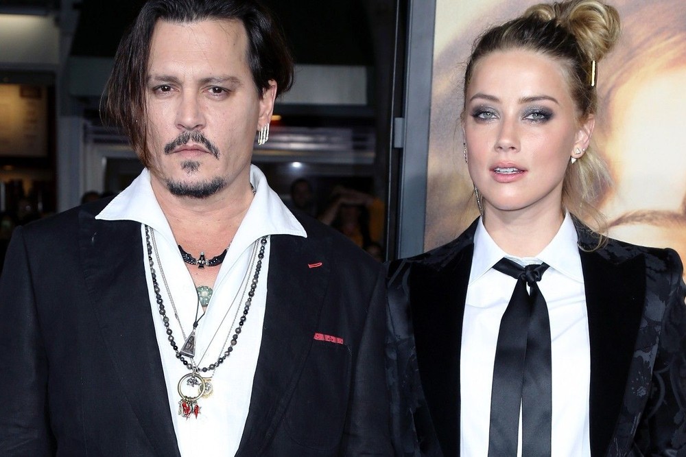 Johnny Depp giành chiến thắng trong vụ kiện với vợ cũ