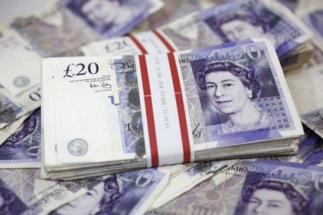 Bưu điện Anh: Lượng rút tiền mặt đạt kỷ lục hơn 800 triệu Bảng trong tháng 7