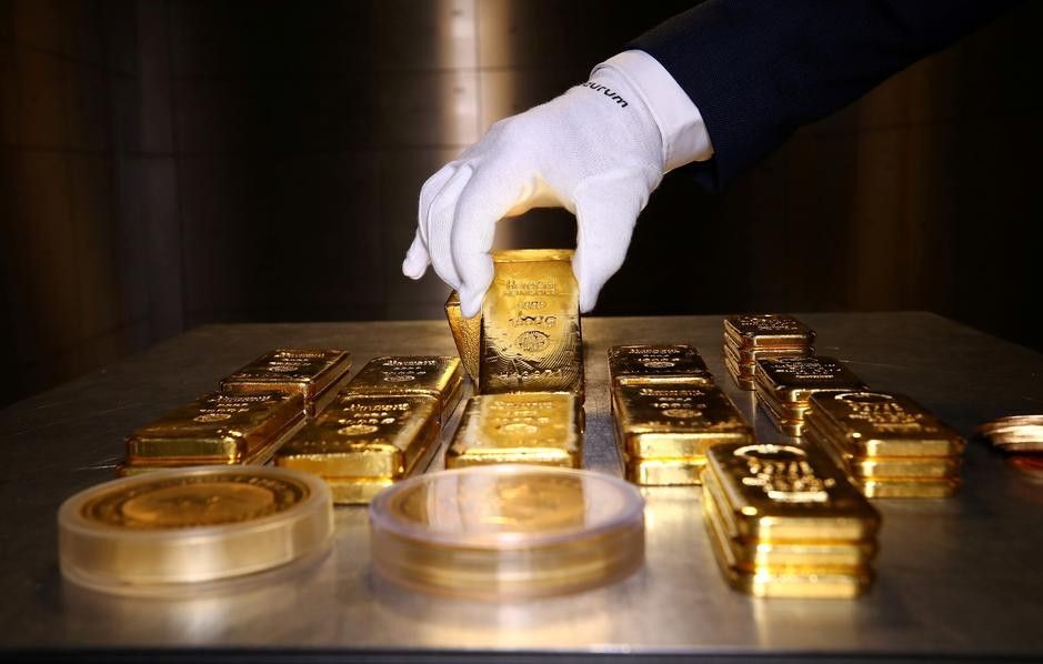 Giá vàng thế giới tiến sát mức cao kỷ lục