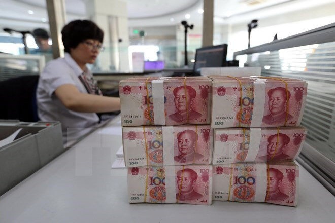 Ngân hàng trung ương Trung Quốc đau đầu với con số 50.000 USD
