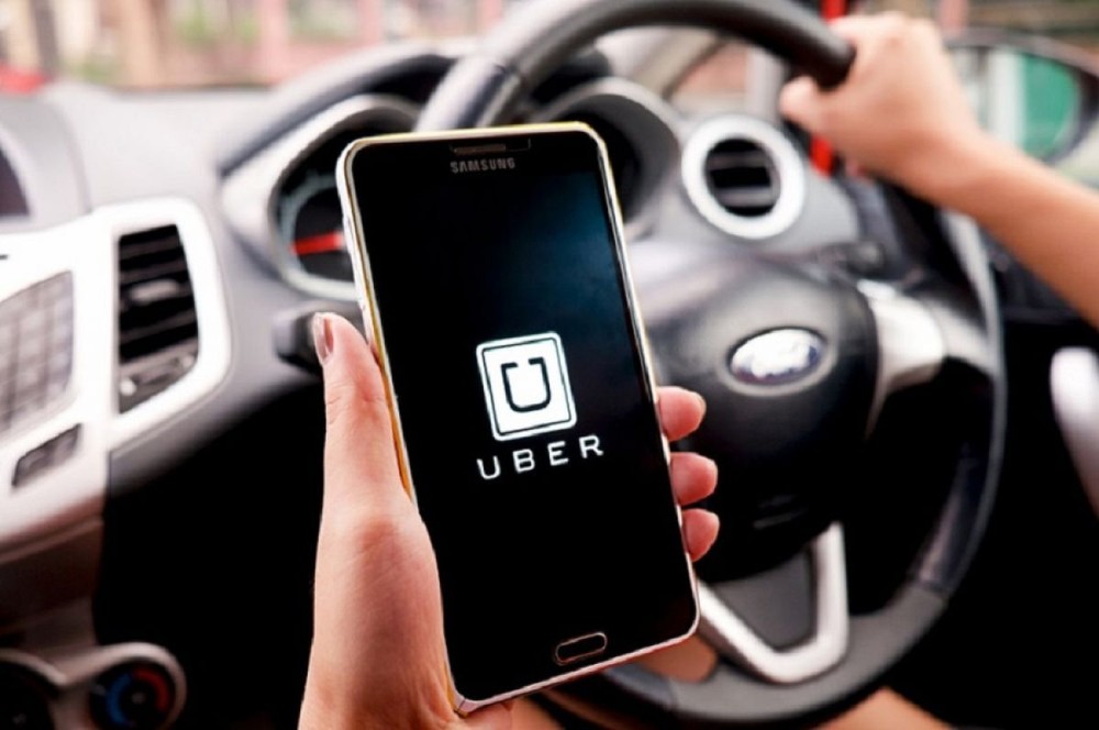 Bộ Giao thông muốn quản lý được Uber, Grab như taxi truyền thống